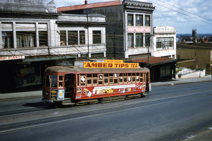 Keith Cullen. December 1956. “CITY via TOWN HALL.” During the last week of trams in Auckland, tram 248 heads to the city from the top of Upper Queen Street.  Photograph supplied by David Cawood.  
