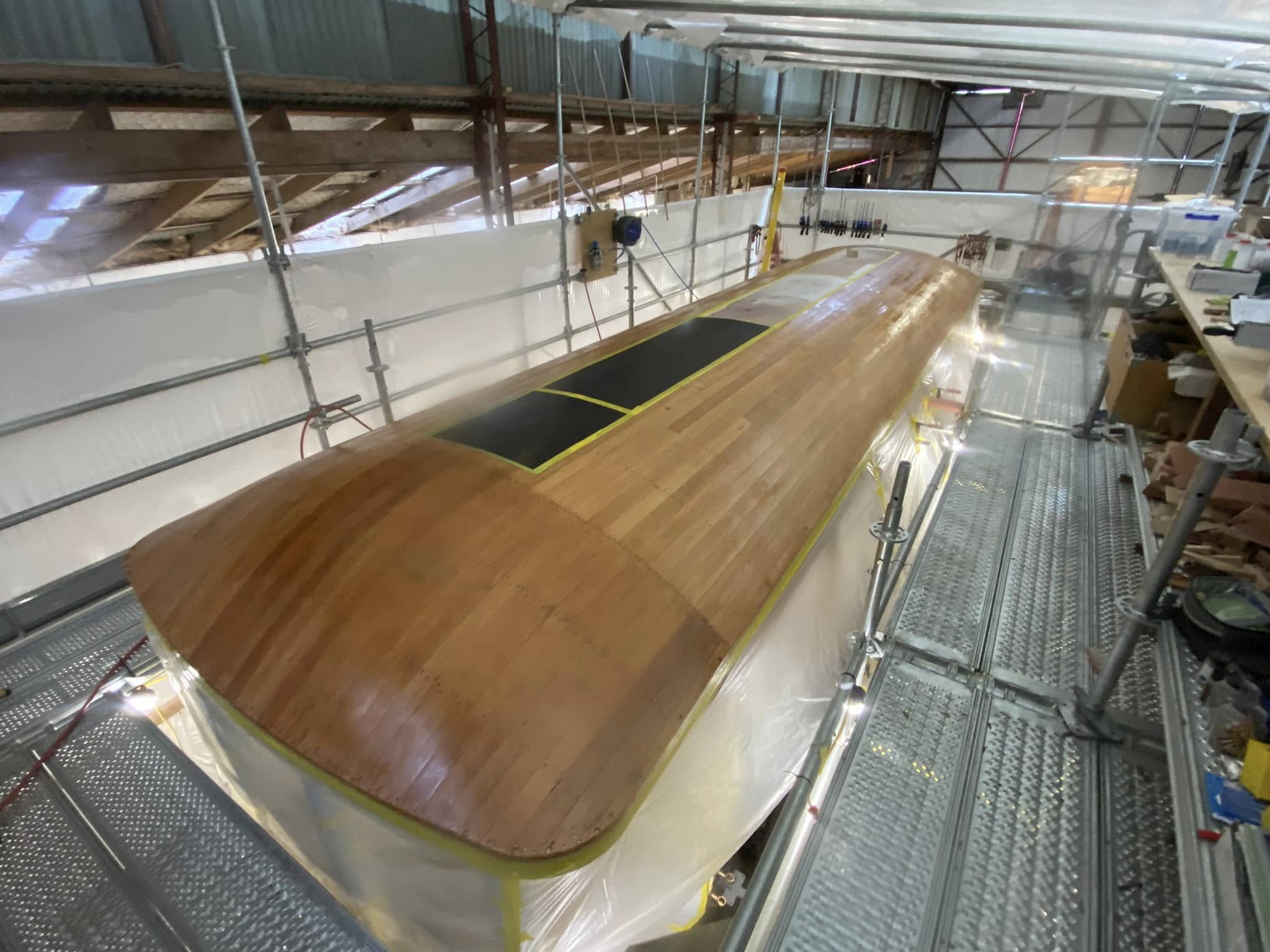 The raw Oregon over the whole roof is waterproofed with 3 coats of Everdure and then filled and faired again.