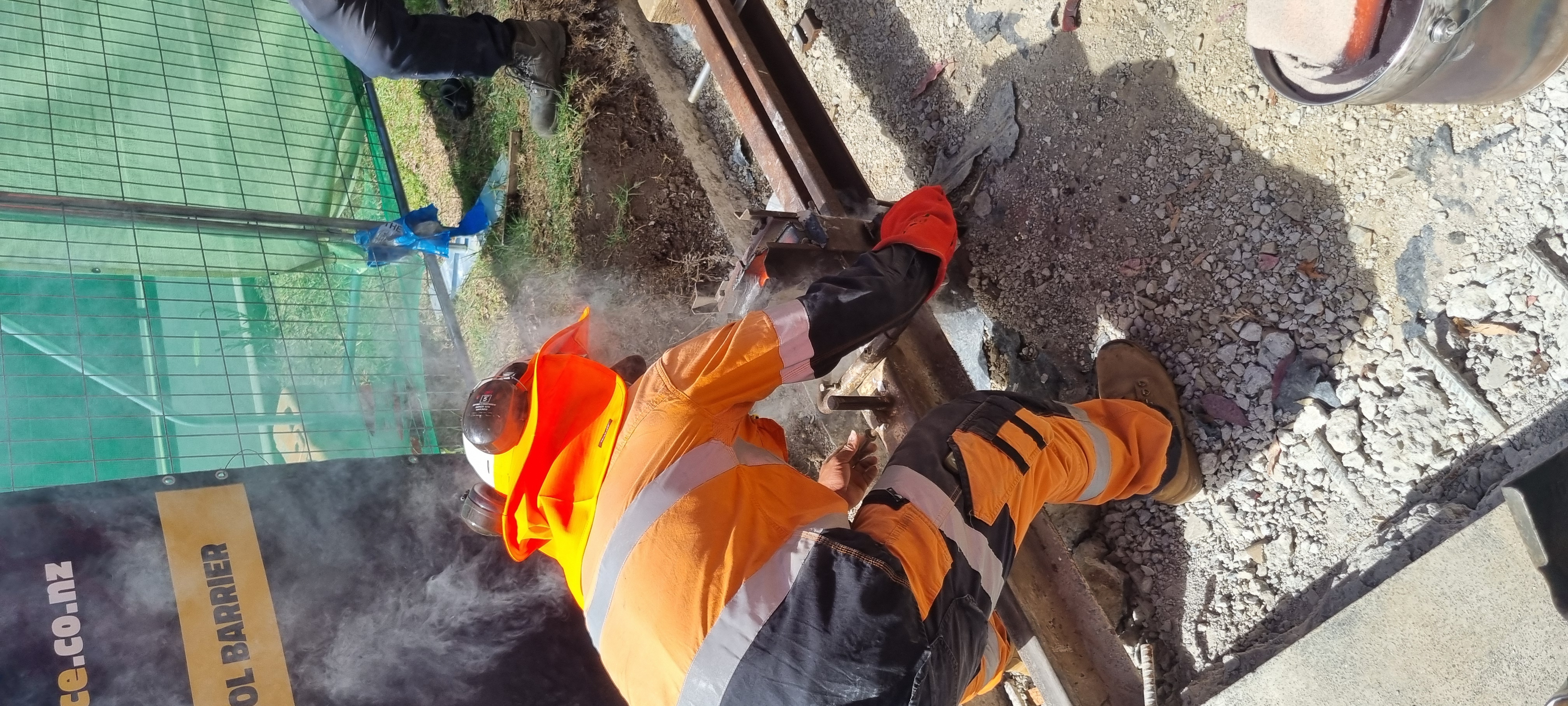 Welding the rails together at the joins