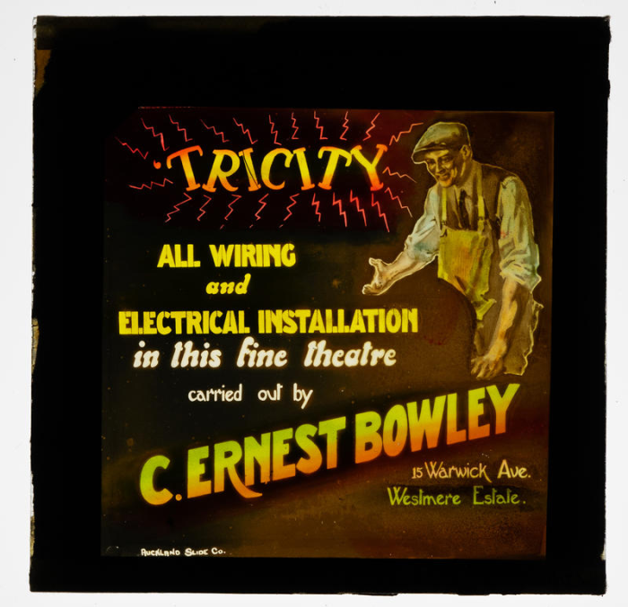 Tricity: All wiring and electrical installation in this fine theatre carried out by C. Ernest Bowley.  Auckland Slide Co. Late 19th Century-Early 20th Century. PHO-2018-22.49.14. Walsh Memorial Library, The Museum of Transport and Technology (MOTAT).