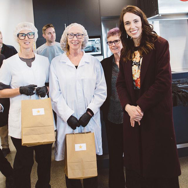 Prime Minister Jacinda Ardern with the Do Gooder team and Nicky Francis (far left)