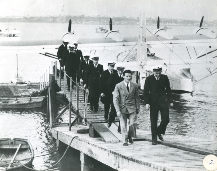 Captain Edwin Musick, Harold Gatty and crew alighting from Pan American Airways, Sikorski S-42B at Mechanics Bay, Auckland after their first Pacific survey flight, March 1937. Whites Aviation Limited. Mar 1937. PAA Sikorski Survey, 15–5120. Walsh Memorial Library, The Museum of Transport and Technology (MOTAT)