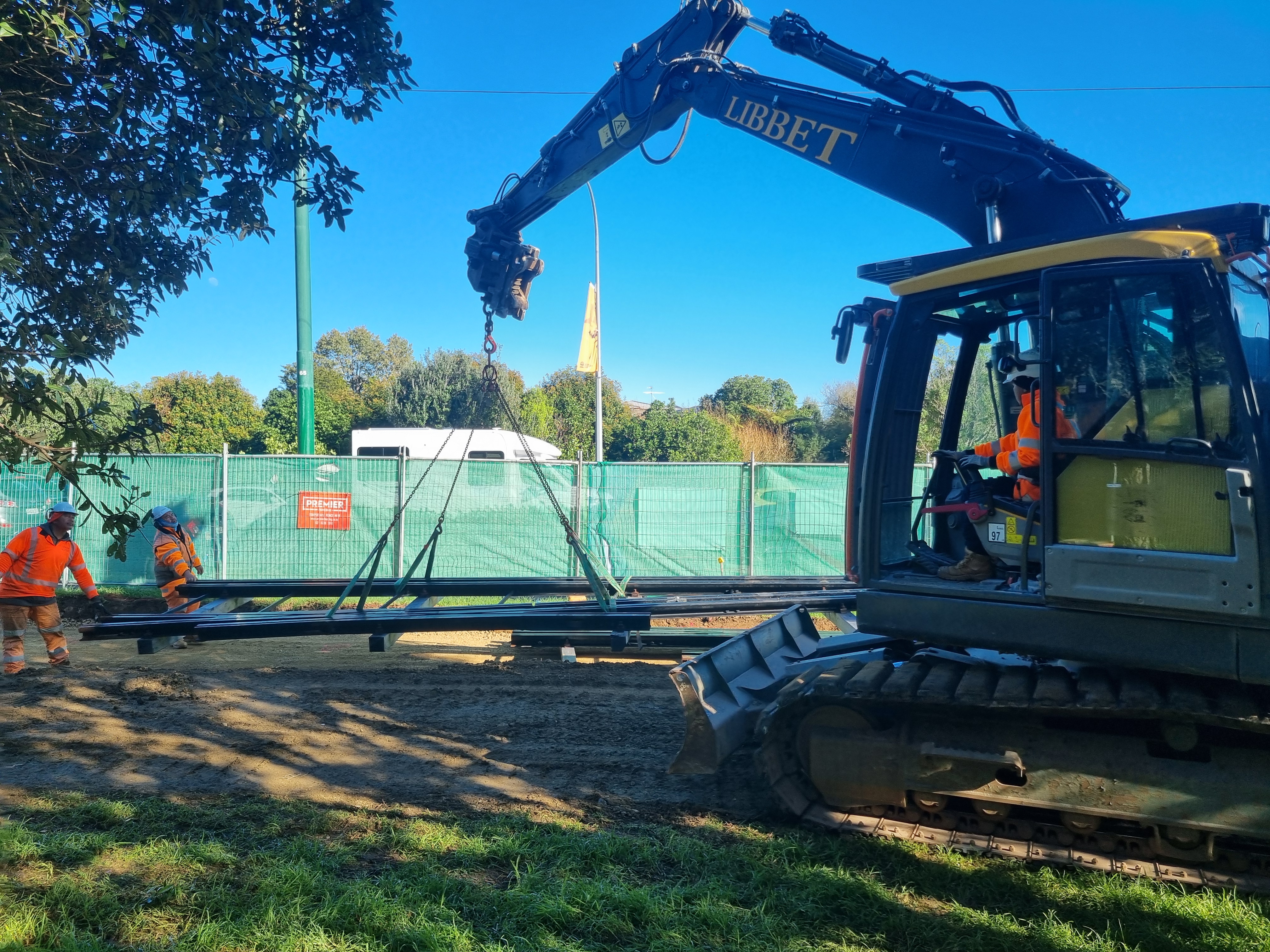 Cranes are needed to lift the rail into position