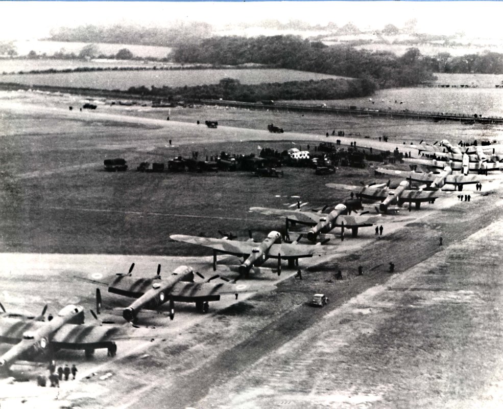 A group of 9 Arvo Lancaster bombers taxi down a runway, Walsh Memorial Library, The Museum of Transport and Technology