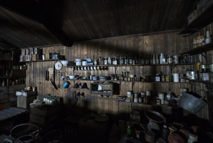 A similar bottle to ours makes an appearance at the centre of the top shelf in this image. Scott’s Hut Kitchen, Photographer Ian McGregor, 2017-18 Season. Antarctica NZ (3rd May 2018). 