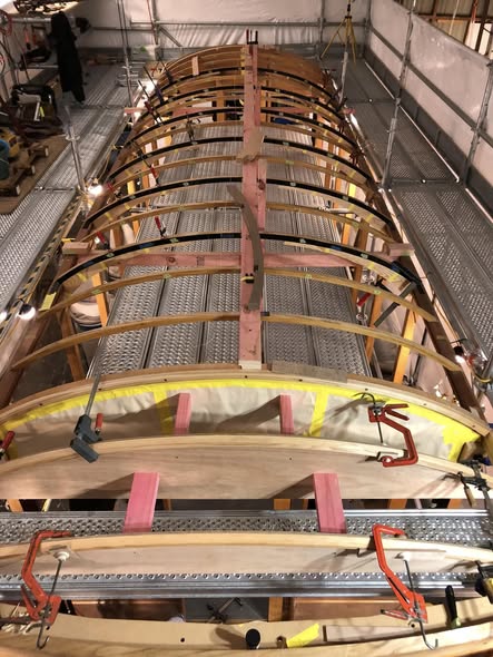 The American ash roof bows are faired, organised and set ready for planking