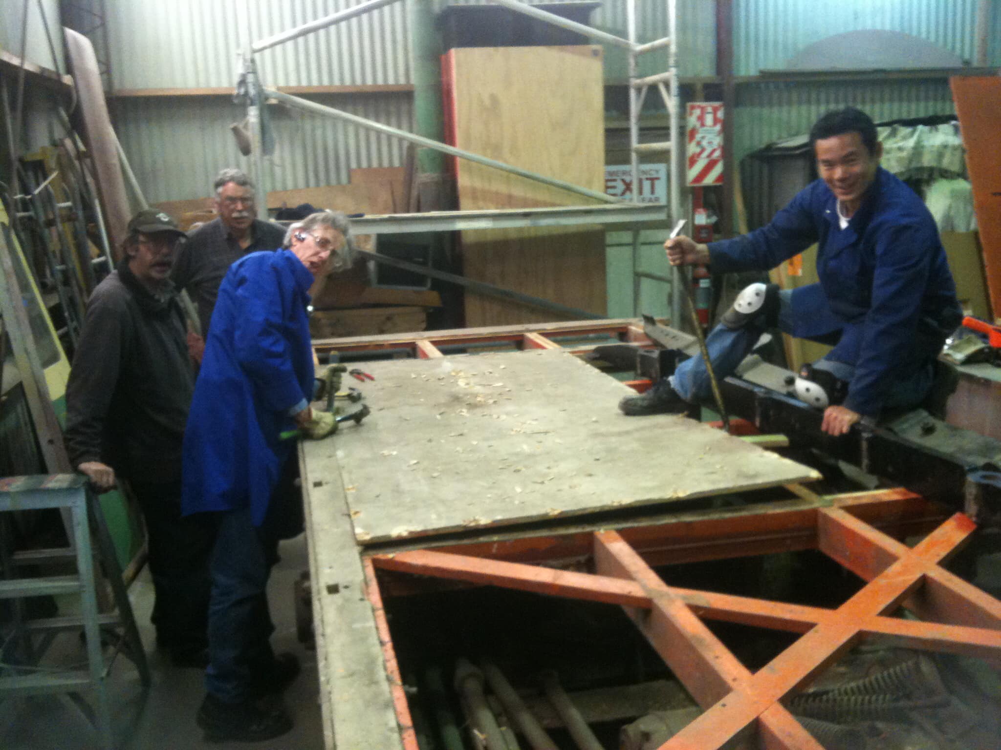 Removing the plywood flooring from the original 1980 restoration attempt