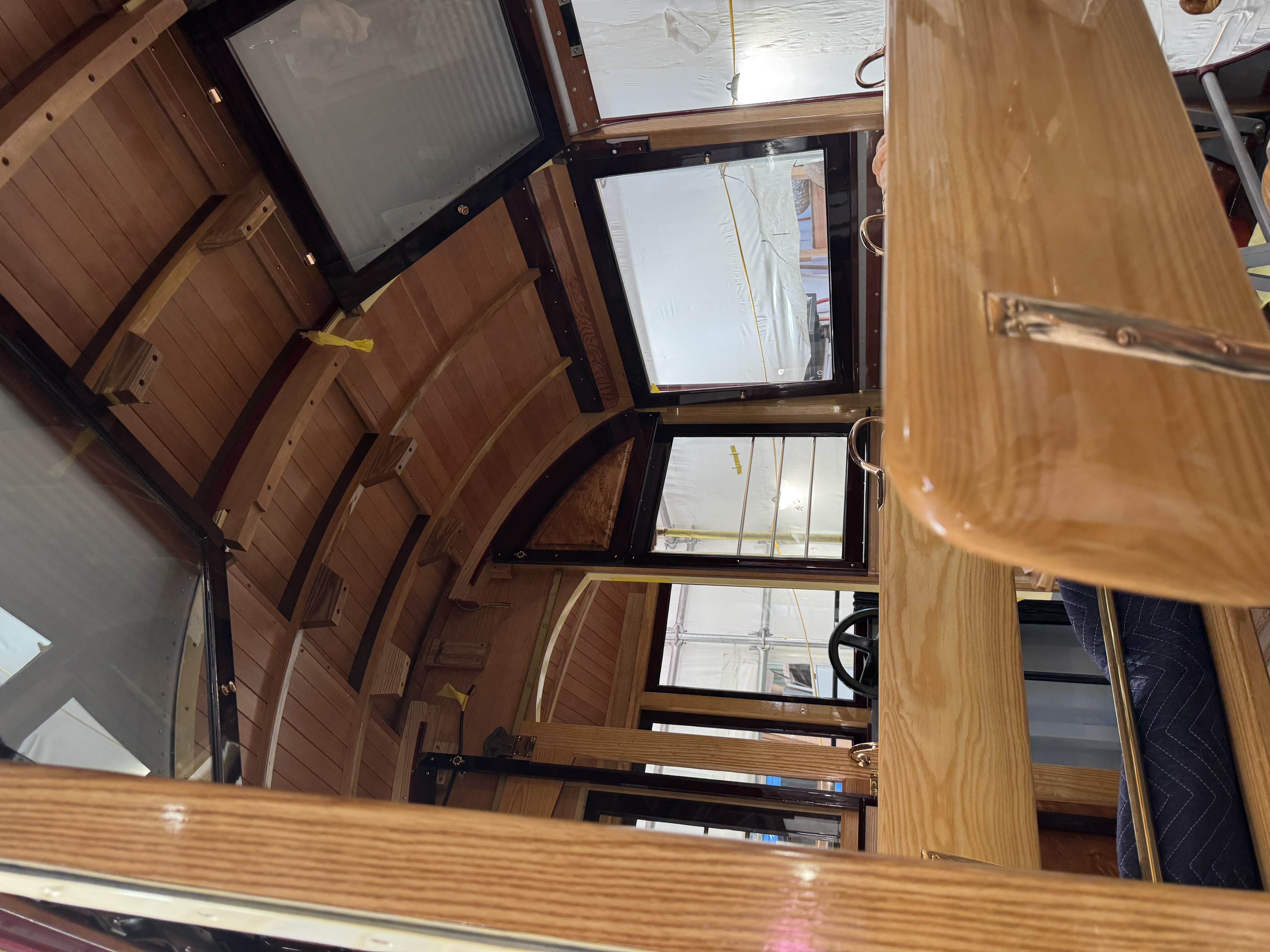 The windows with Australian red cedar frames are installed, like the aluminium panels, they slide up into the ceiling.