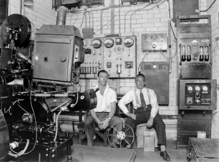 Motion picture projection room, 1930s. John McGuire et al. 13-2271. Walsh Memorial Library, The Museum of Transport and Technology (MOTAT).
