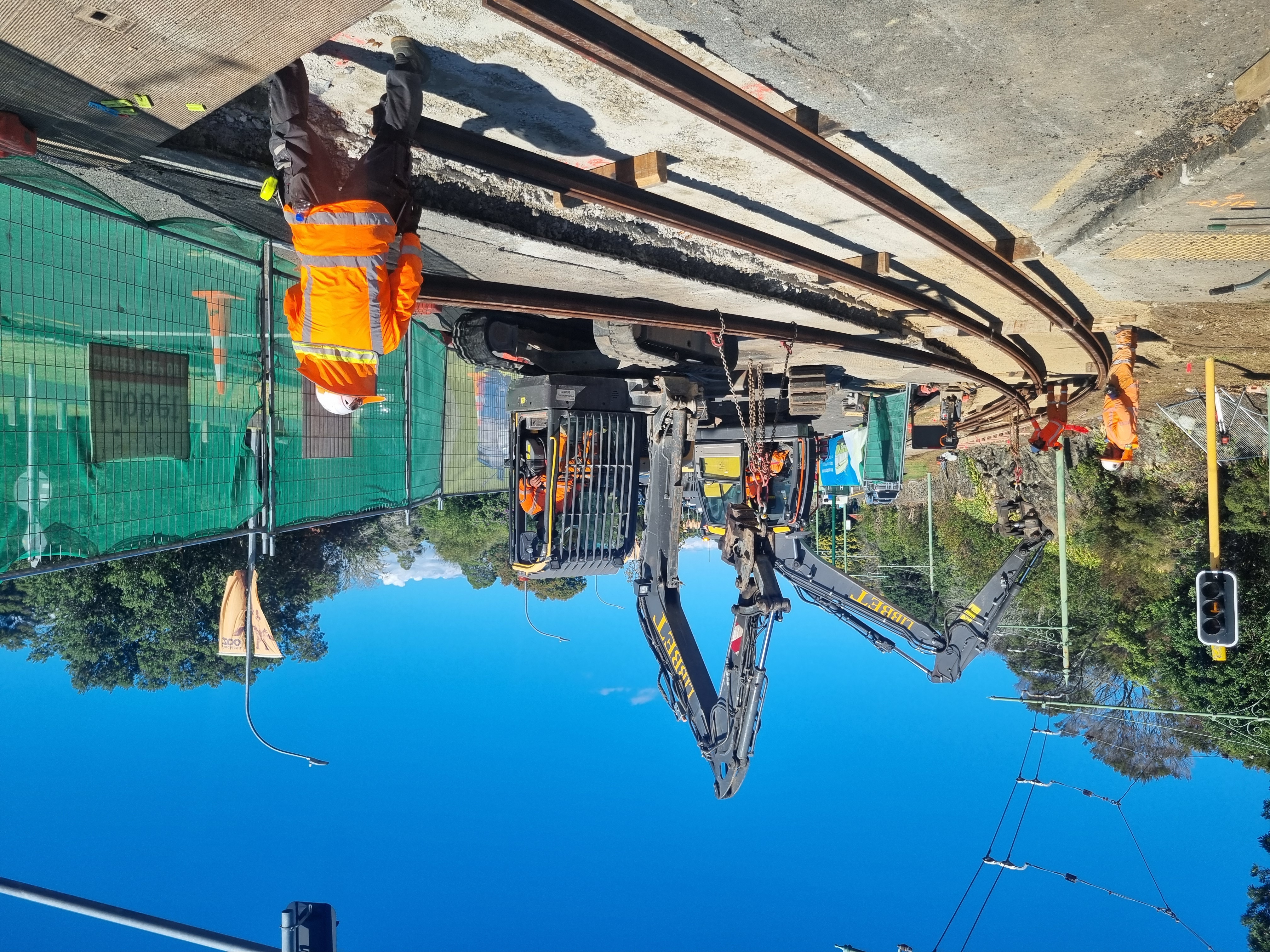 Laying new rails in place at the Motions Road crossing