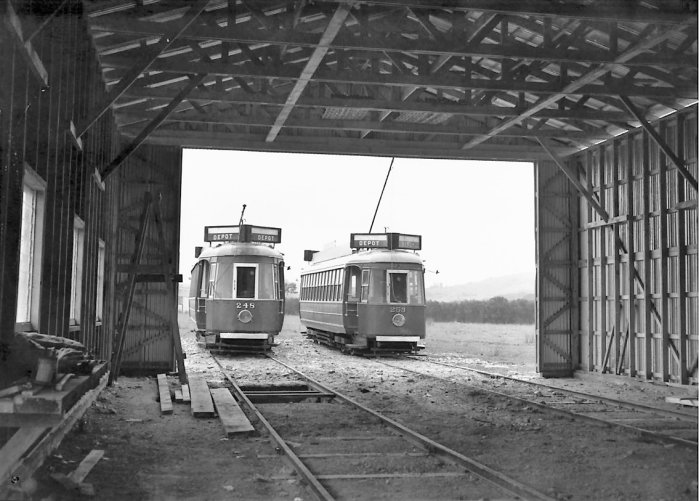 Graham Stewart. 1957. Trams 248 and 253 enter the purpose-built tram barn at Matakohe, Te Tai Tokerau. The Old Time Transport Preservation League were very close to having an operational tramway in Auckland before MOTAT was formed. Supplied by David Cawood. 