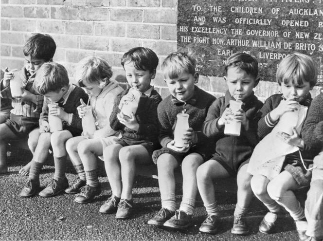 School children drinking free milk