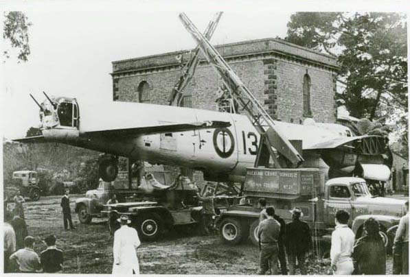 Two cranes lifting the Avro Lancaster off a transporter at MOTAT, in 1964, Walsh Memorial Library, the Museum of Transport and Technology (MOTAT).