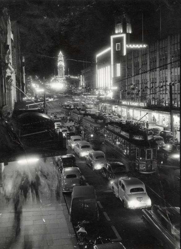 Graham Stewart. Queen Street lit up for the visit of Queen Elizabeth, Christmas 1953. Auckland Trams, 08/092/401. Walsh Memorial Library, The Museum of Transport and Technology (MOTAT).