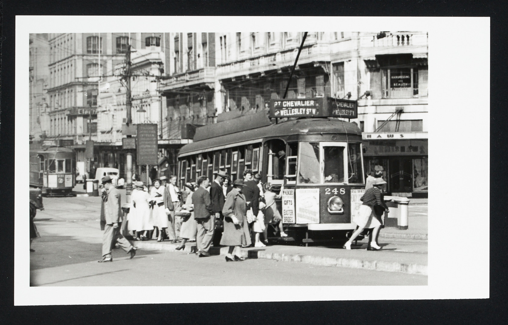 Graham Stewart. Early 1950s. [Passengers boarding tram 248 on Point Chevalier, Wellesley Street West route], PHO-2020-19.455. Walsh Memorial Library, The Museum of Transport and Technology (MOTAT). 