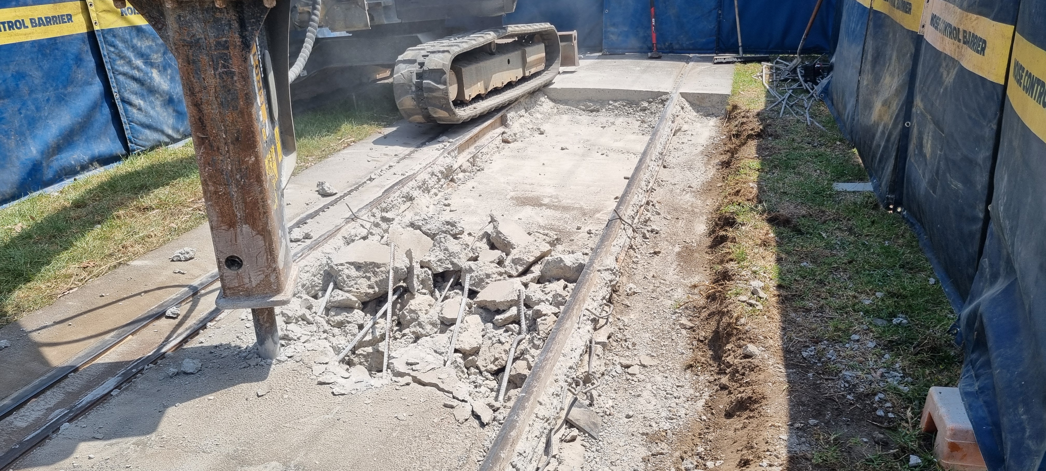 The first phase of work is to break up and remove the concrete surrounding the tram tracks, and associated steel reinforcements. 