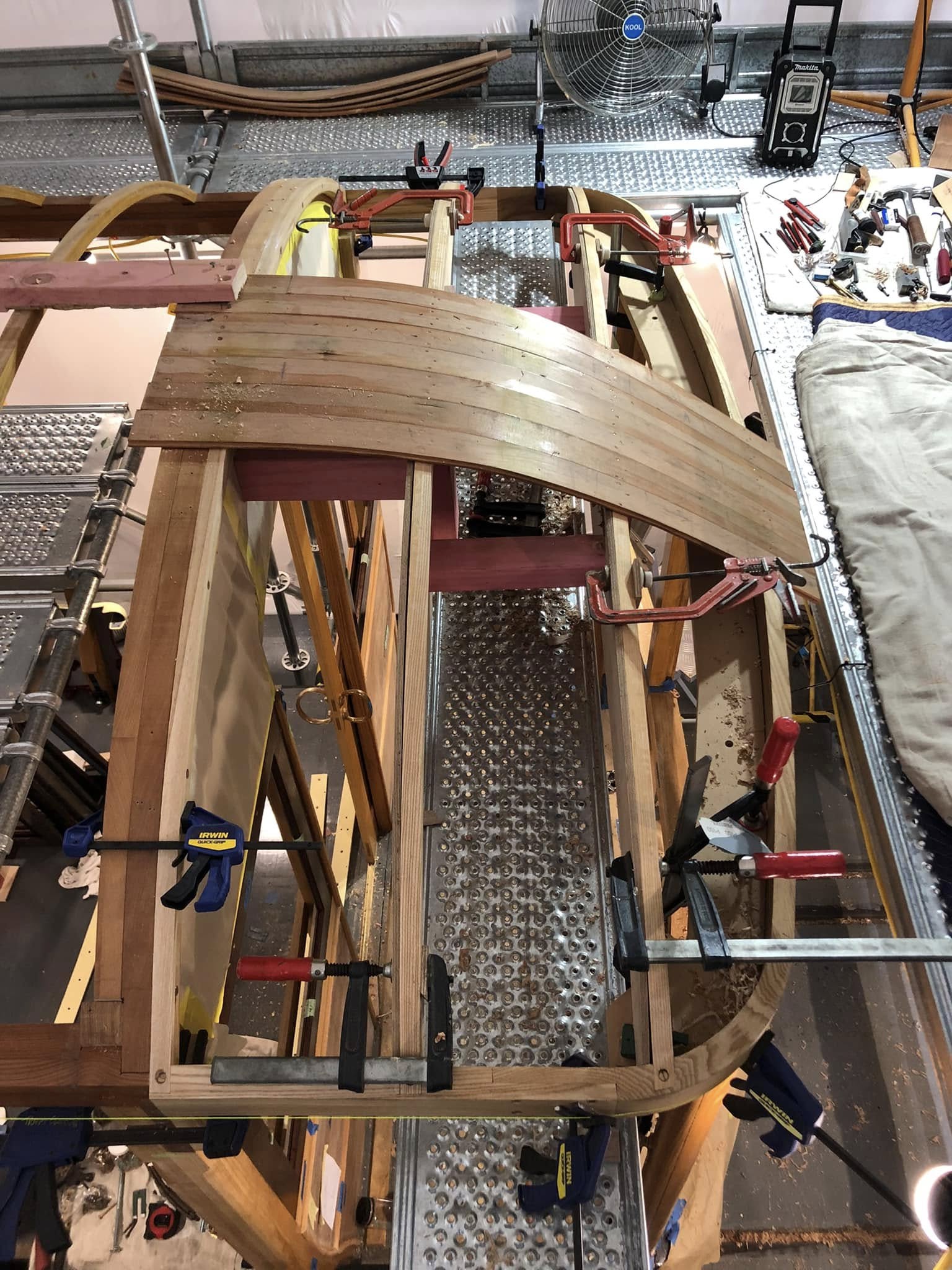 Steaming and installing of the Oregon planking at the vestibule ends begins.