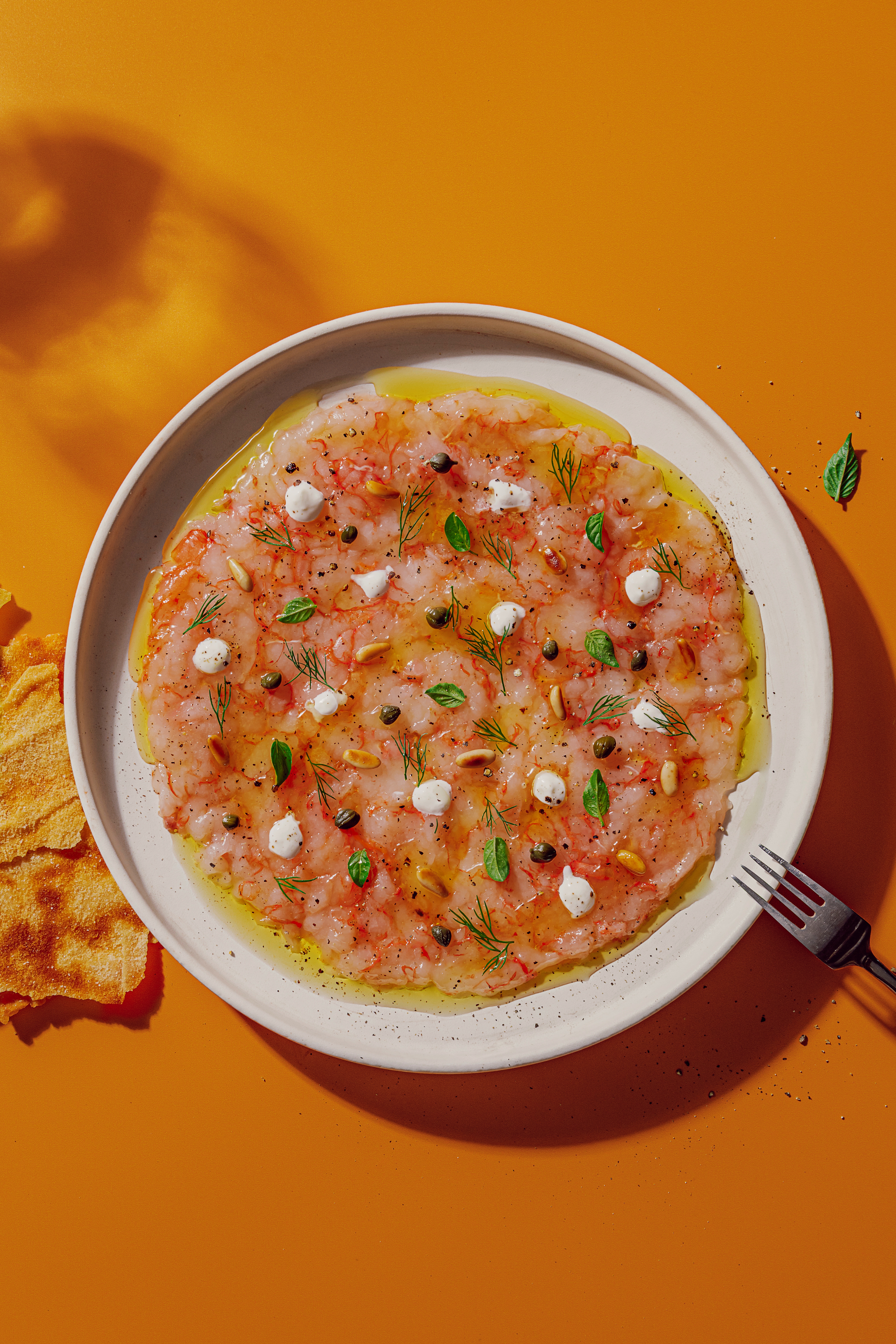 Carpaccio de gamba vermella amb burrata