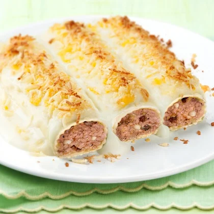 Canelons de Sant Esteve amb panses i pinyons