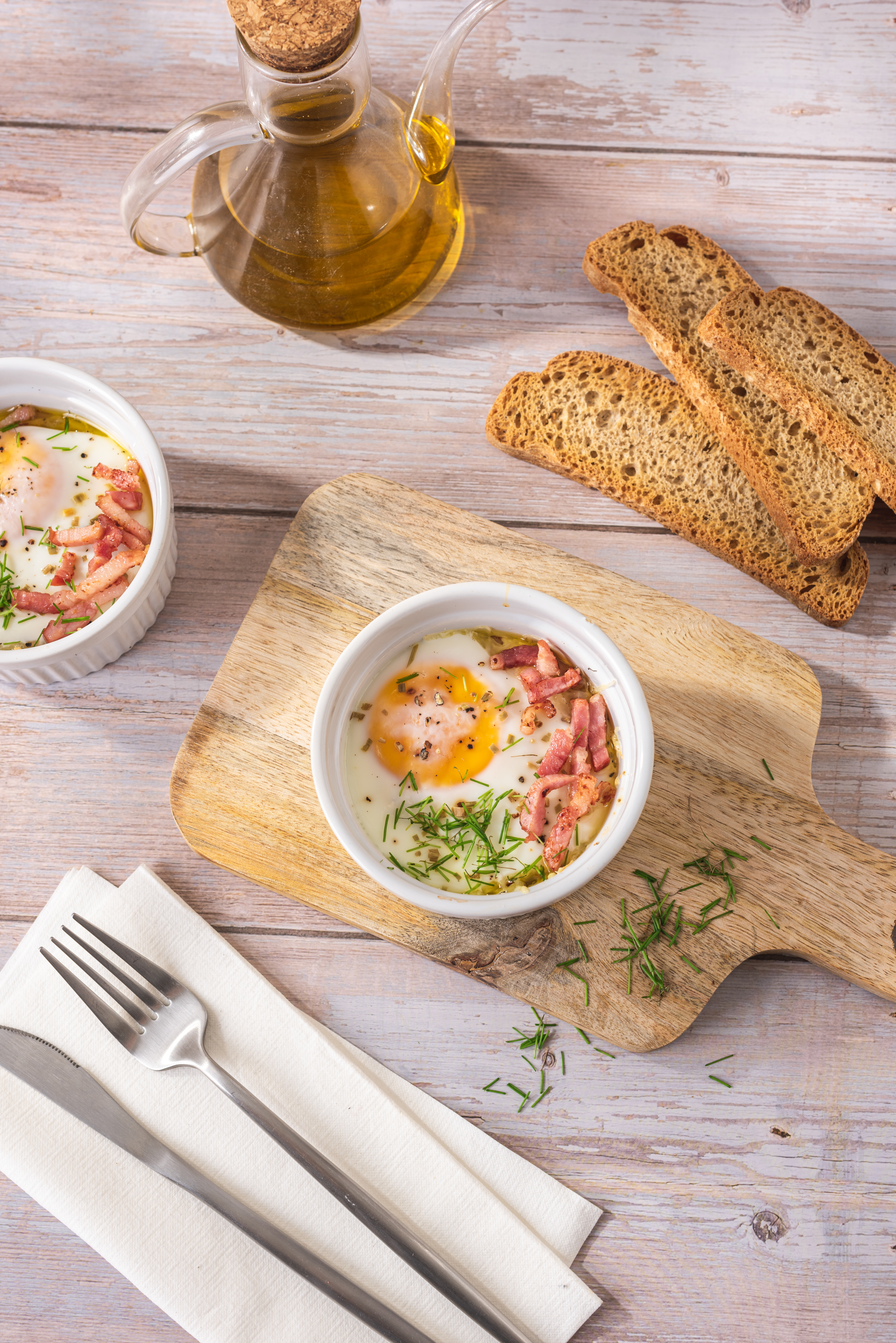 Ous en Cocotte amb Bacon Fumat 