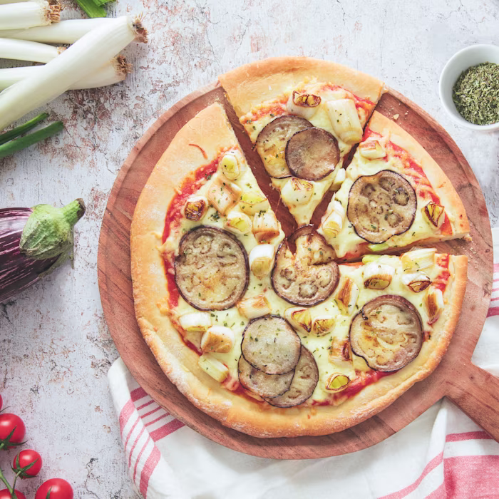 Pizza de calçots i albergínia