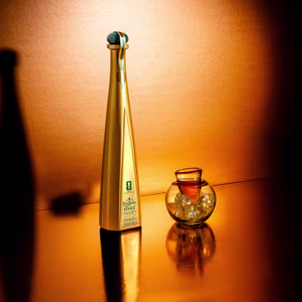 Tequila Don Julio 1942 FIFA World Cup 2026™ Edition next to a shot glass