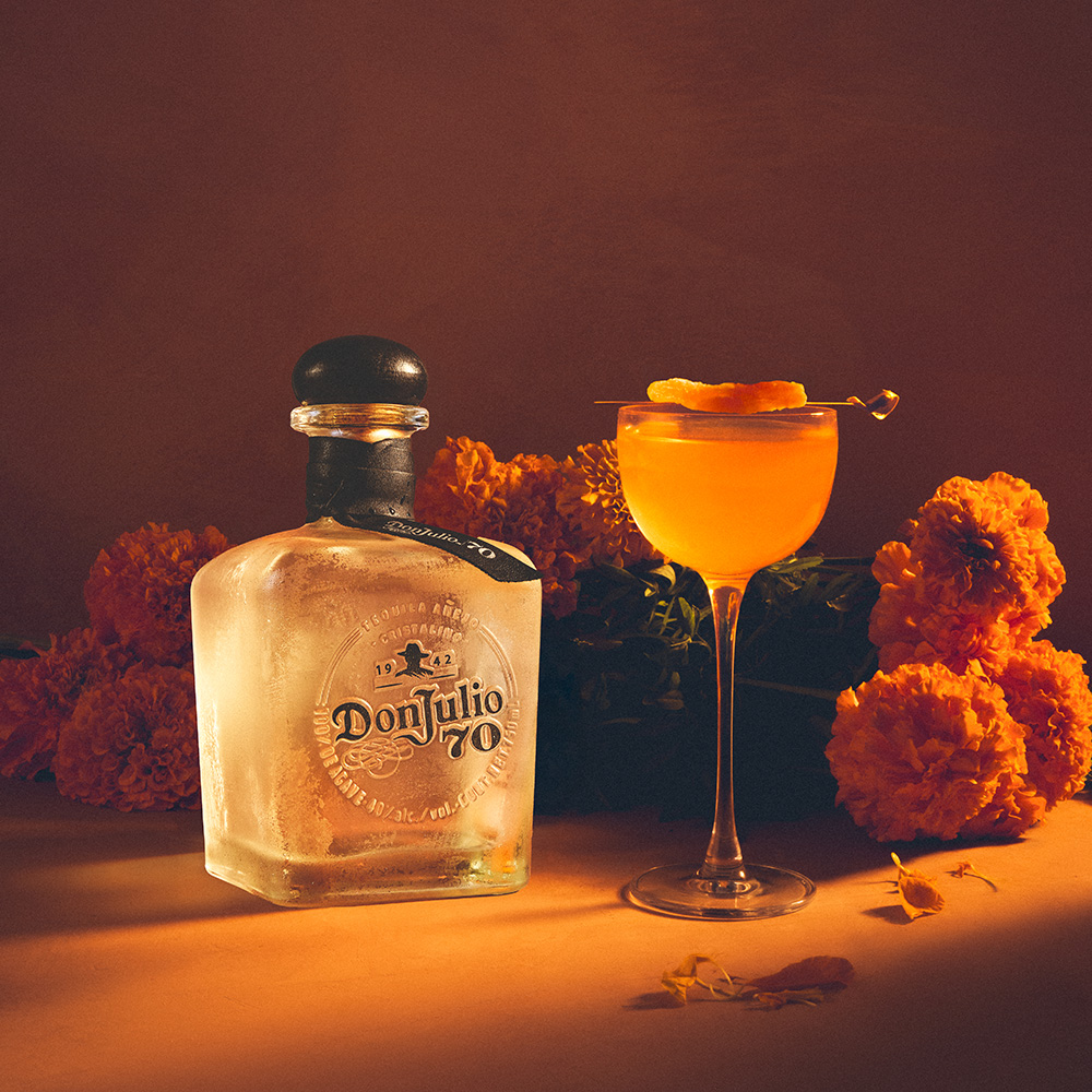 Buenos Dias Recipe next to a Tequila Don Julio 70 Añejo Cristalino Limited Edition Bottle Designed by Patricio Campillo bottle
