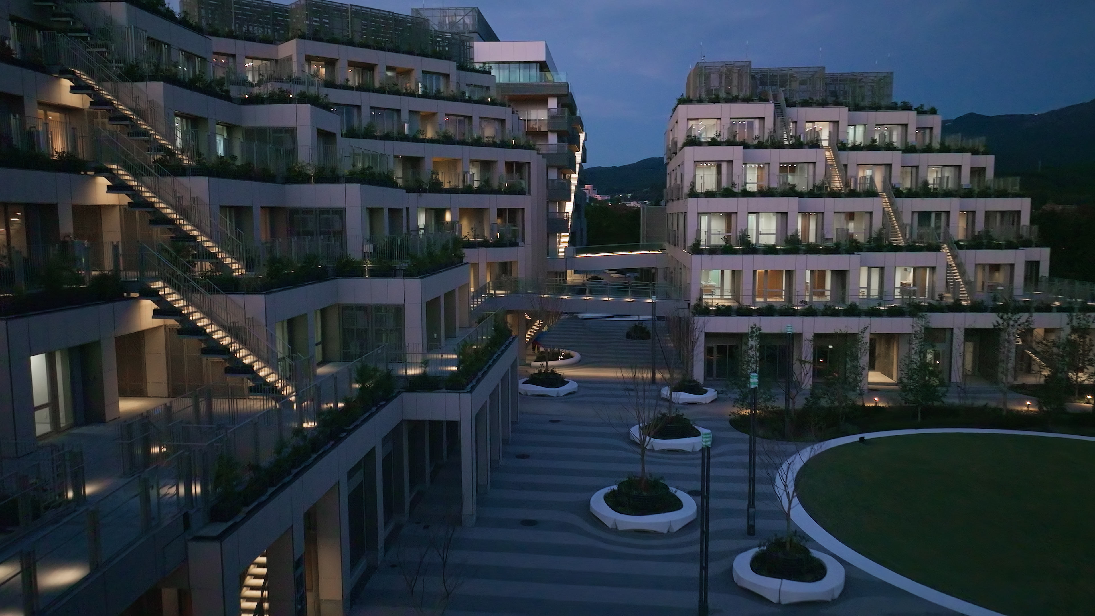 Side view of the courtyard and a few of the buildings in Woven City