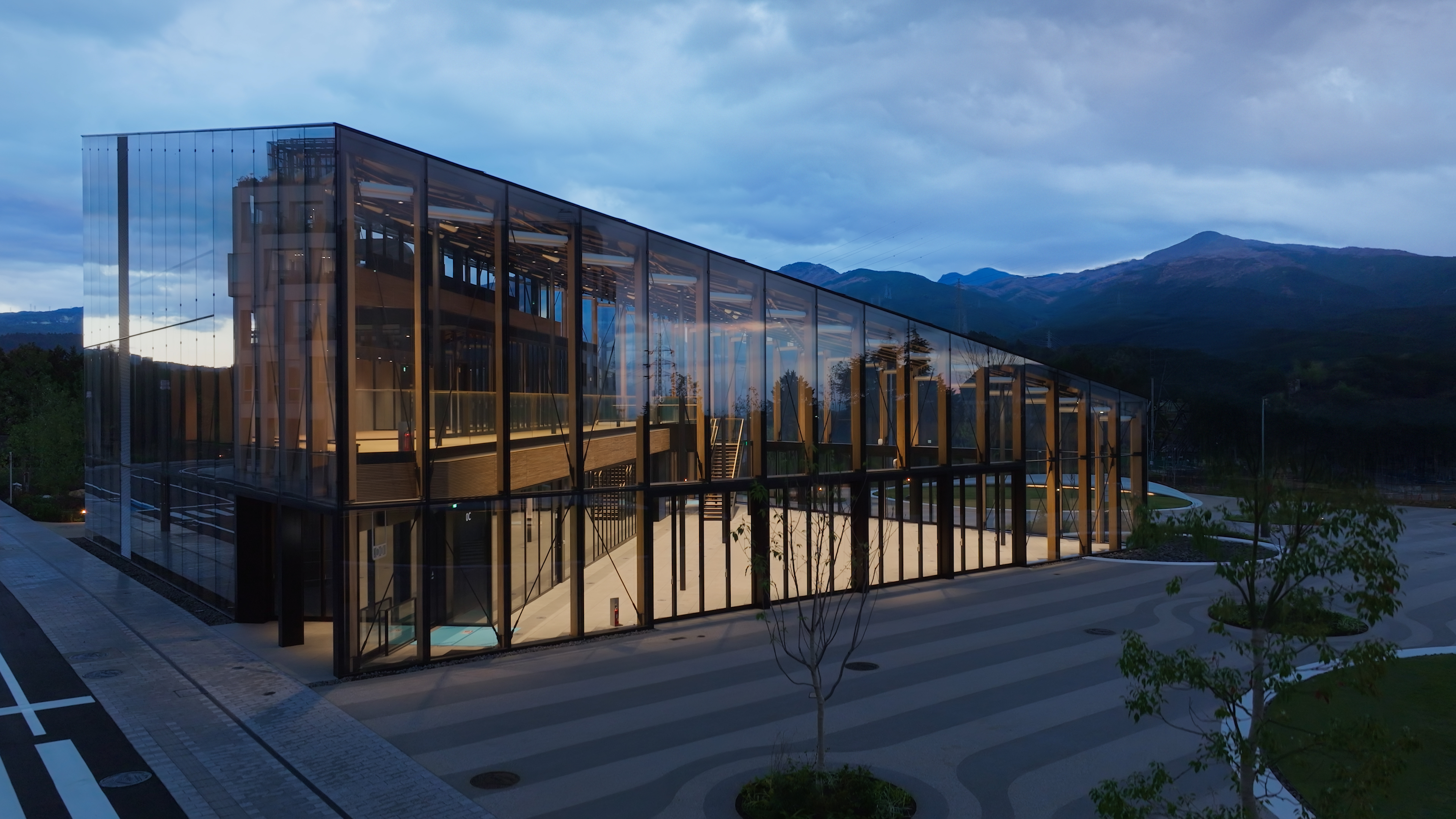 Side view of a building in Woven City that uses glass as a main feature