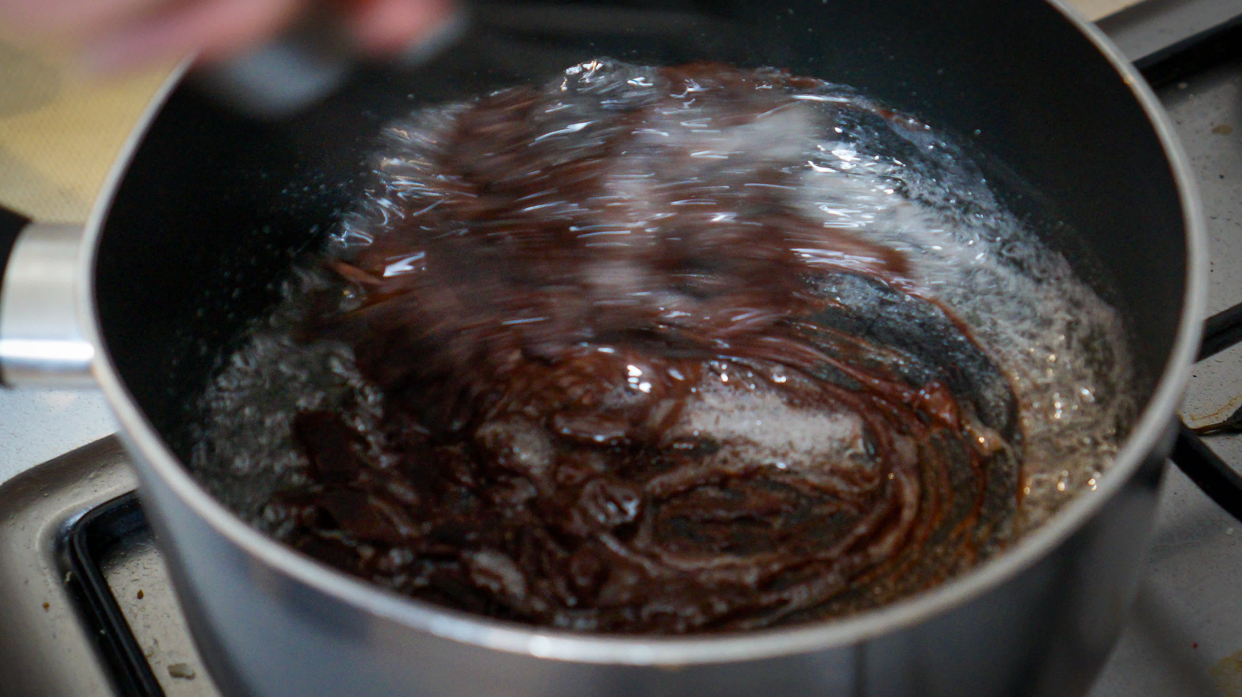 beginning-to-mix-chocolate-in-syrup