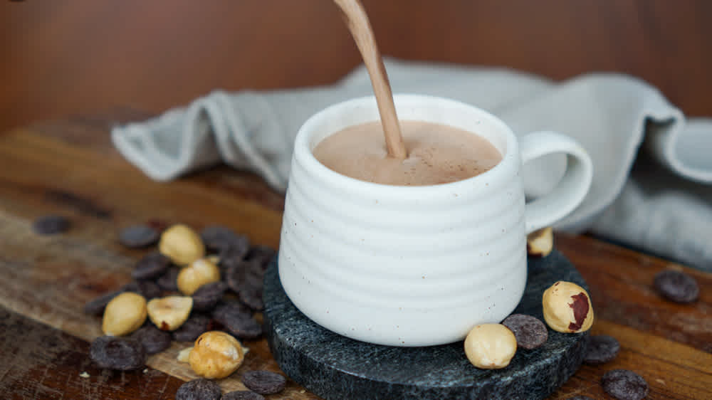 hazelnut-hot-chocolate-pouring-into-mug