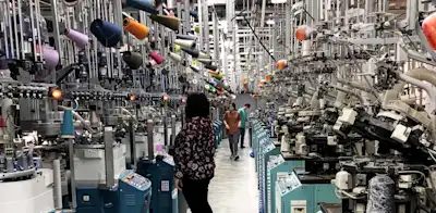 Header image showing a factor floor 