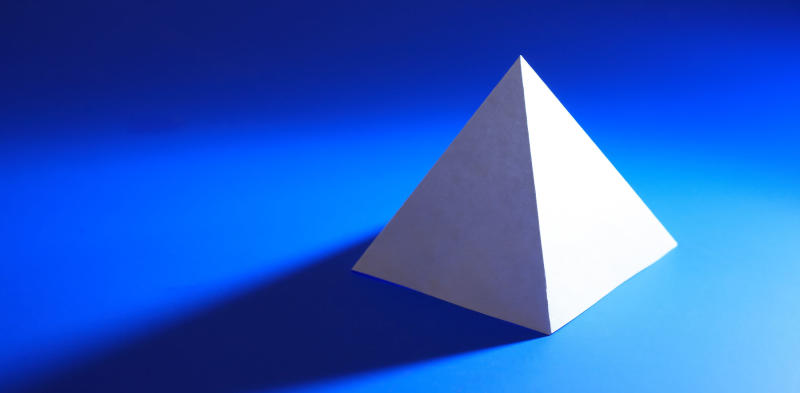 white pyramid on blue background