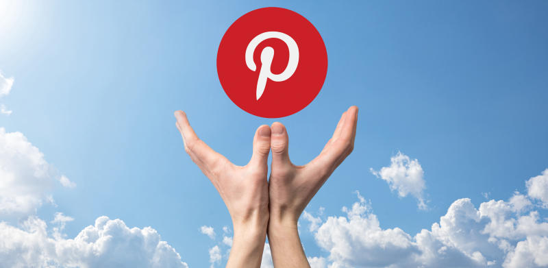 hands pointing towards sky with pinterest logo