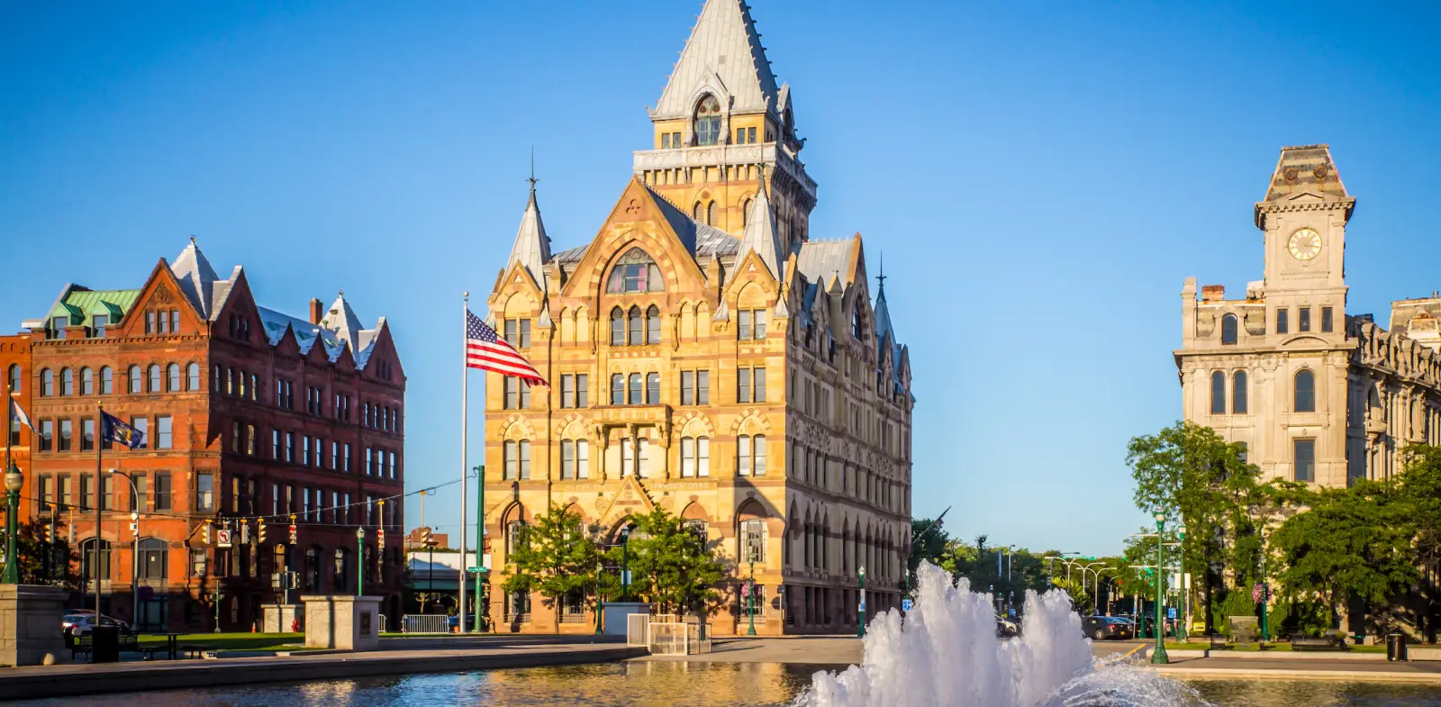 Downtown Syracuse New York with view of historic buildings and fountain at Clinton Square