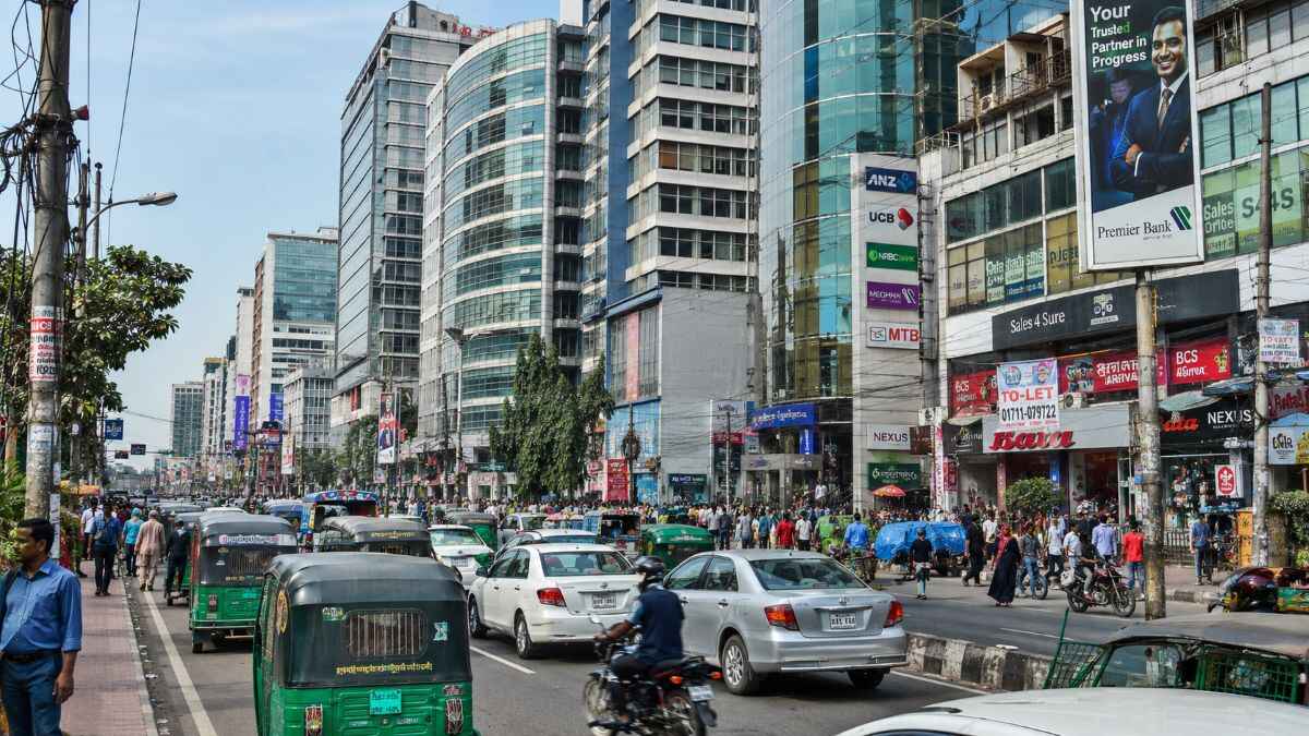 Busy Dhaka business district showing the scale of companies that need HR software