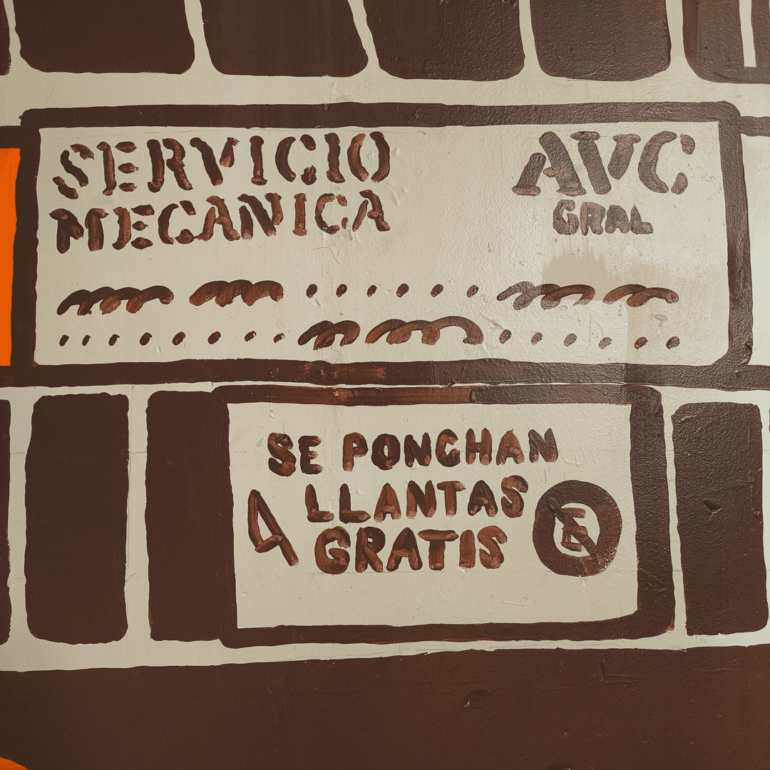 undefined undefined : More details of signage. These signs are common in Mexico, “Se ponchan llantas gratis” — basically translating to, “park here and I’ll slash your tires free.”