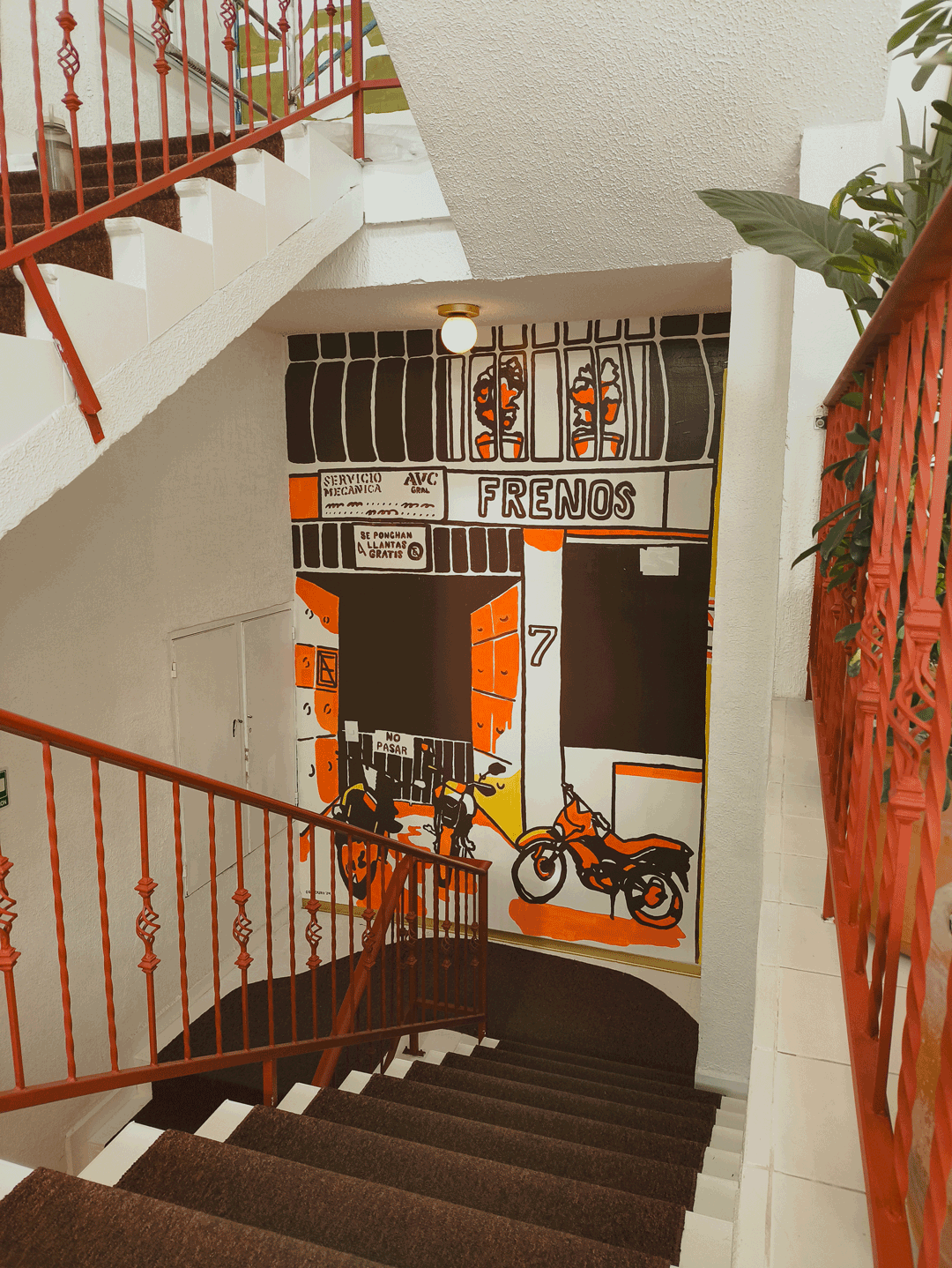 undefined undefined : This colour palette was my first choice and inspired the hues in the other murals above. I love how the chocolate brown, vibrant orange, and yellow harmonize with the red-orange and brown details throughout the building.