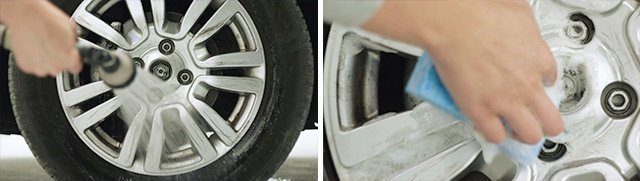 Hand holding hose spraying wheel and rim and hand scrubbing rim with soapy sponge