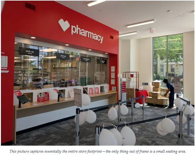 A picture of the inside of a pharmacy-only CVS location. The store is small, featuring only a pharmacy desk, a place to line up, and seating for a waiting area.