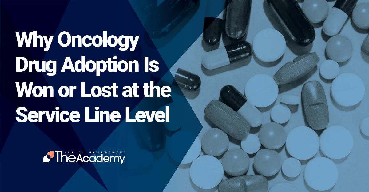 Close-up of various medical capsules and pills on a blue-toned background, representing oncology drug adoption and pharmaceutical service line strategies.