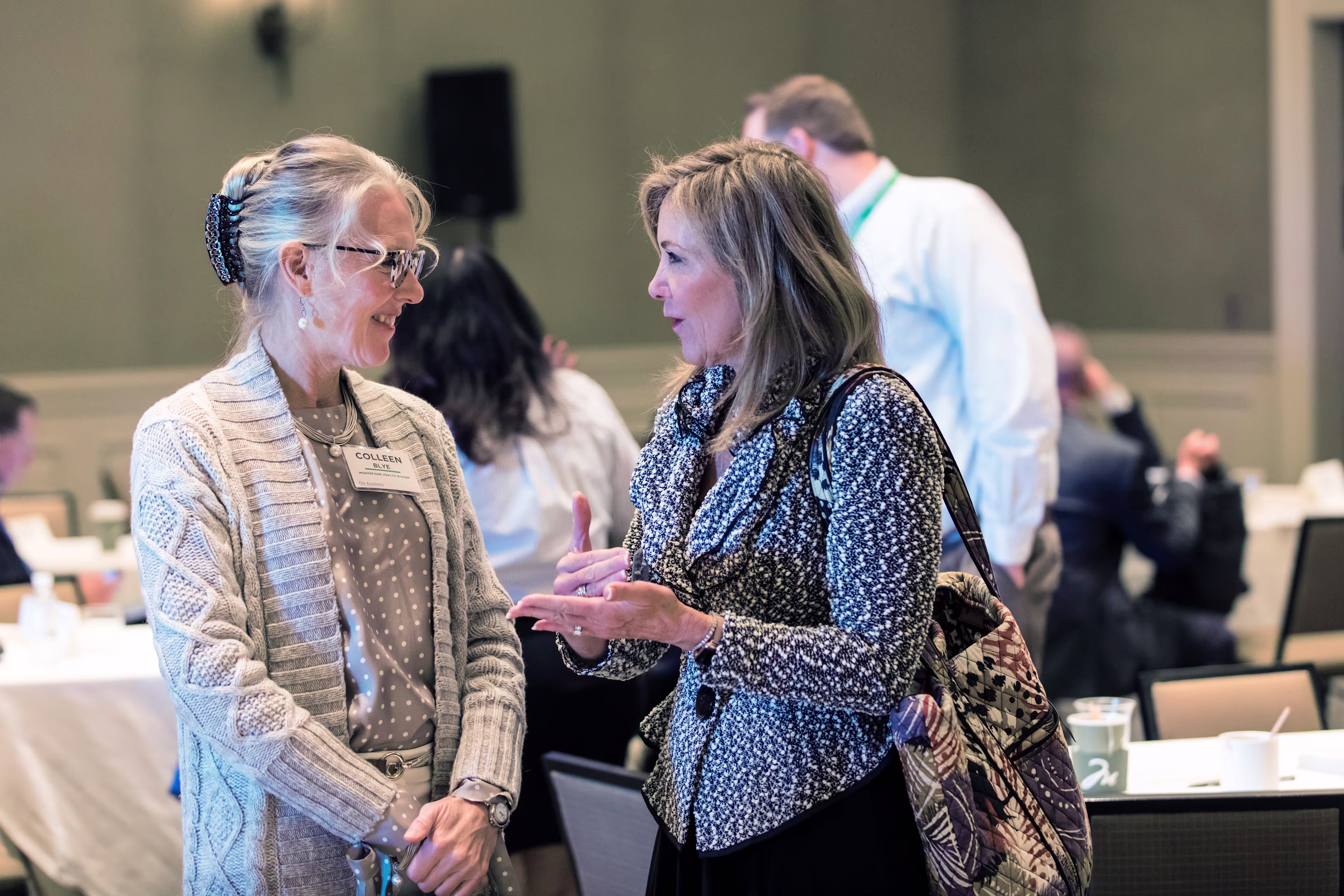 Two members speaking at our nursing leadership conference