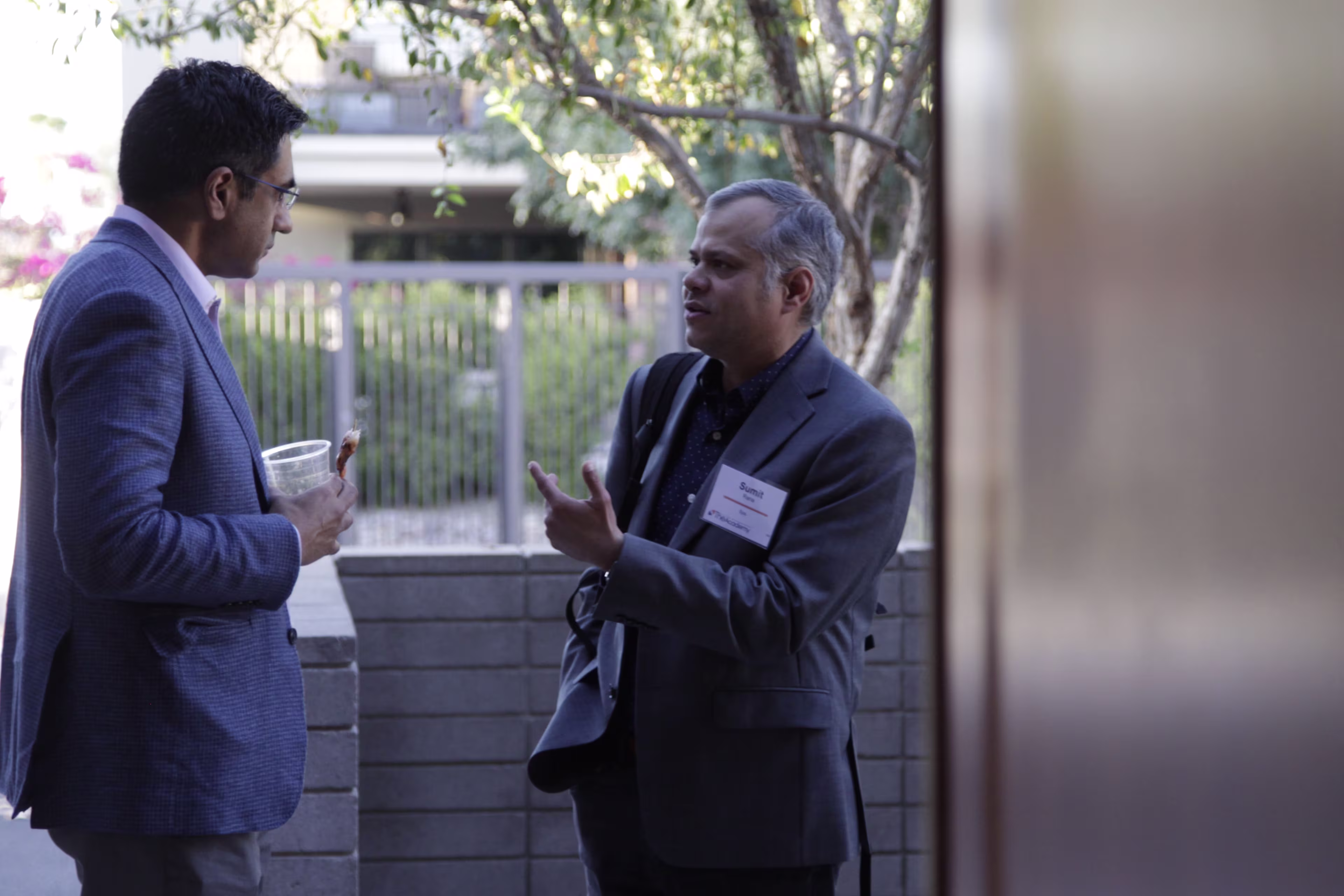 Oncology conference discussion among senior health system leaders and industry executives