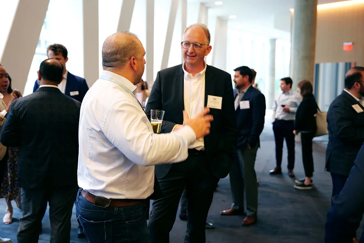 Senior health system executives and industry innovators engaged in peer-to-peer discussion in the conference hall at the THMA Chief AI Officer Forum.