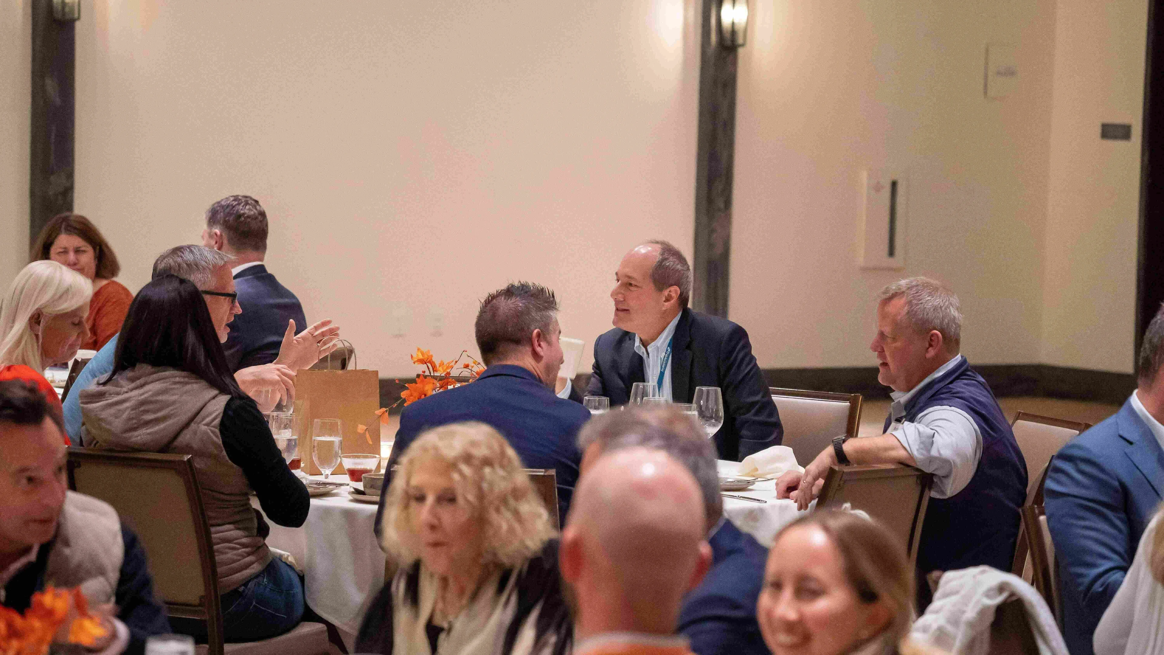 Industry and health system members converse at a THMA healthcare leadership conference