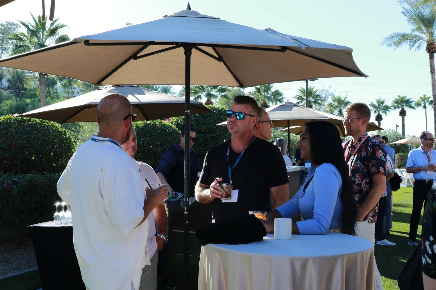 Healthcare executives networking during an orthopedic conference hosted by The Health Management Academy.