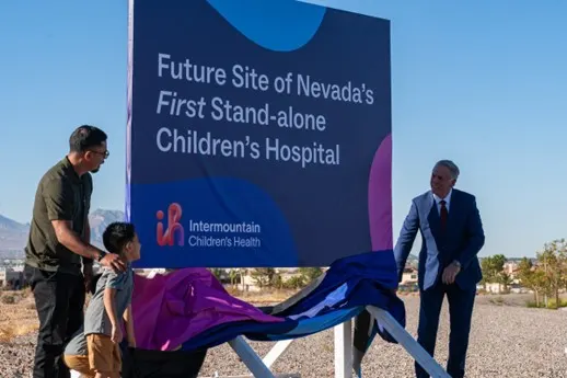 A photo of a sign announcing the future site of Intermountain's Las Vegas pediatric hospital.
