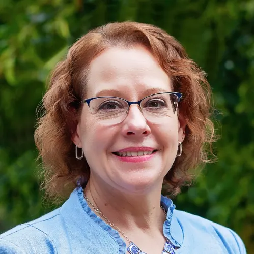 A headshot of Caryn Esten