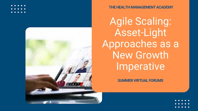 Group of healthcare executives standing outdoors in front of a historic stone building, surrounded by lush greenery under a bright, clear sky, posing together during a professional event.