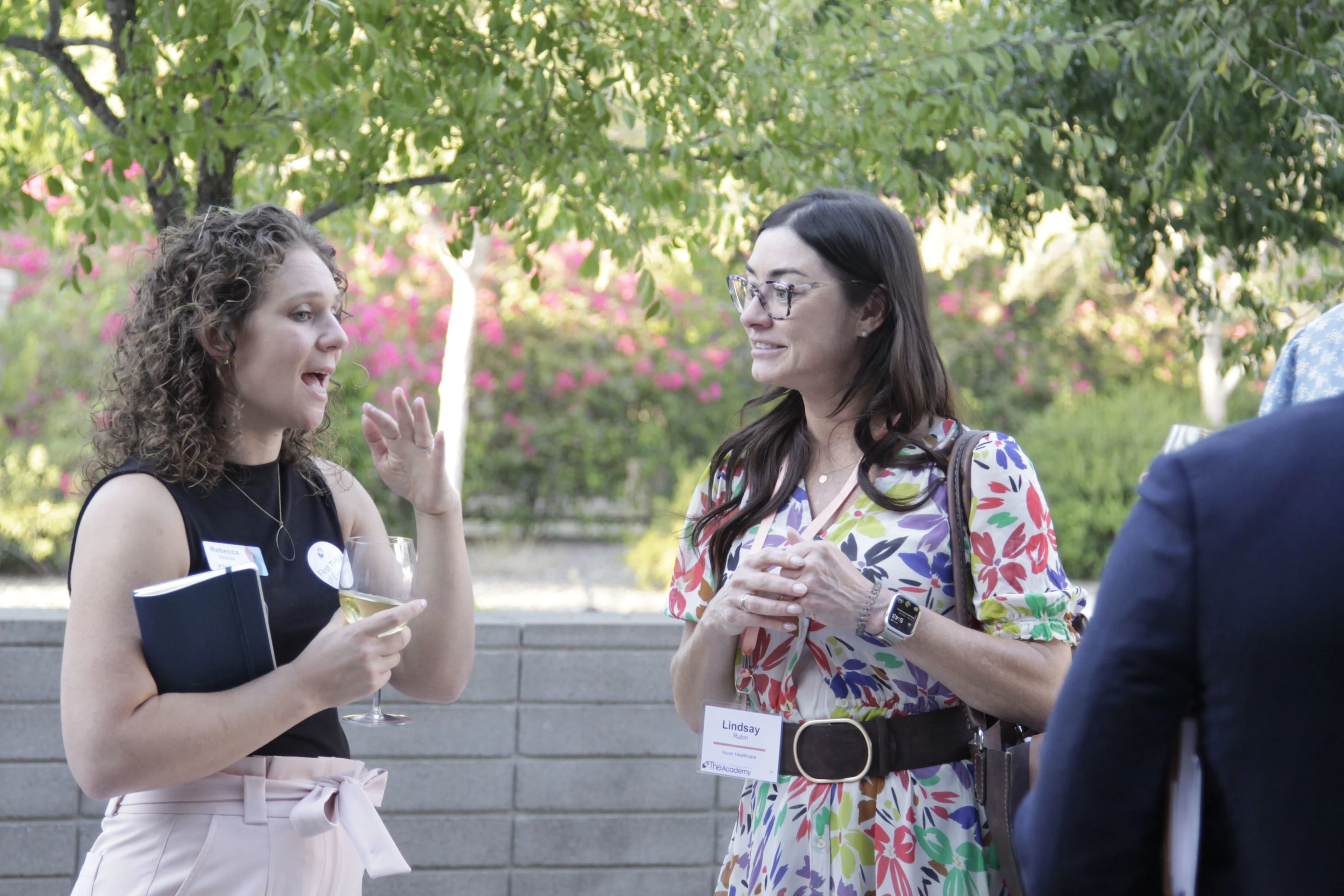 Orthopedic conference discussion among health system leaders and industry executives in a collaborative forum setting.